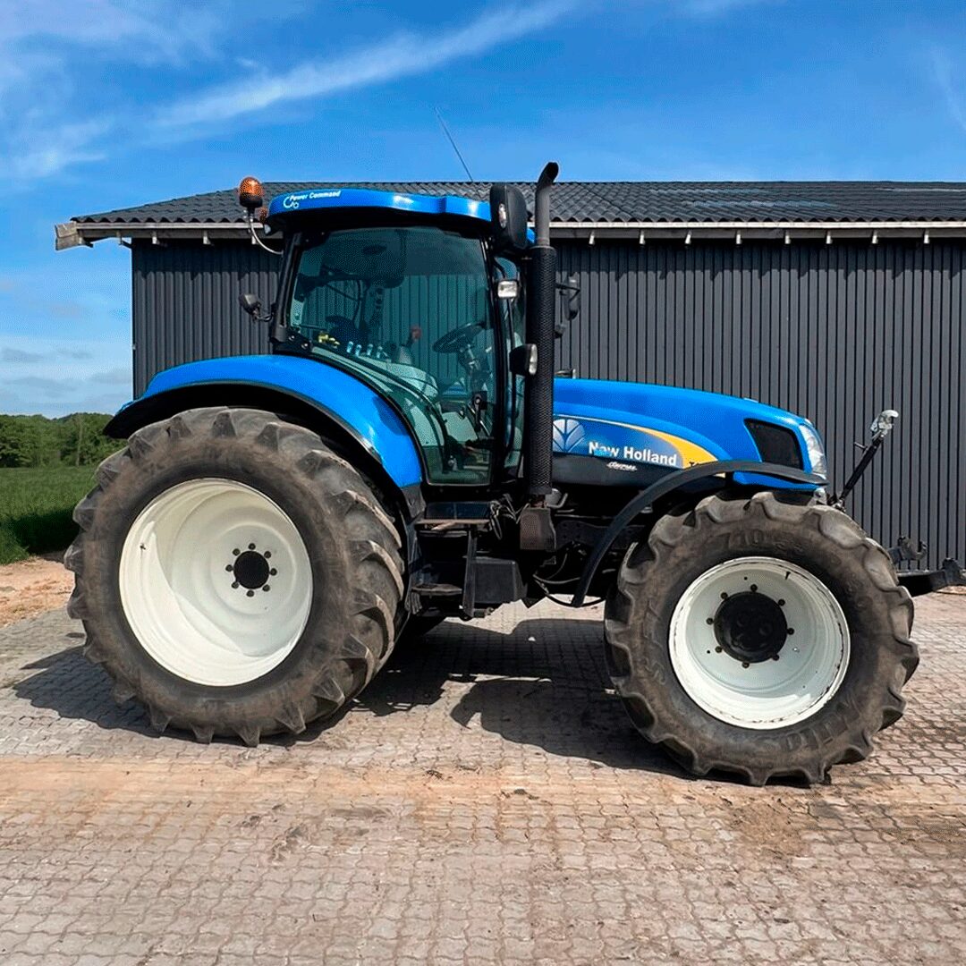 Tractor New Holland TM7040 18x6 NP dual rad — foto 1 de 5